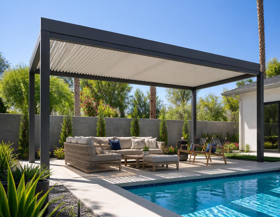 Freestanding aluminum patio cover shading a poolside seating area