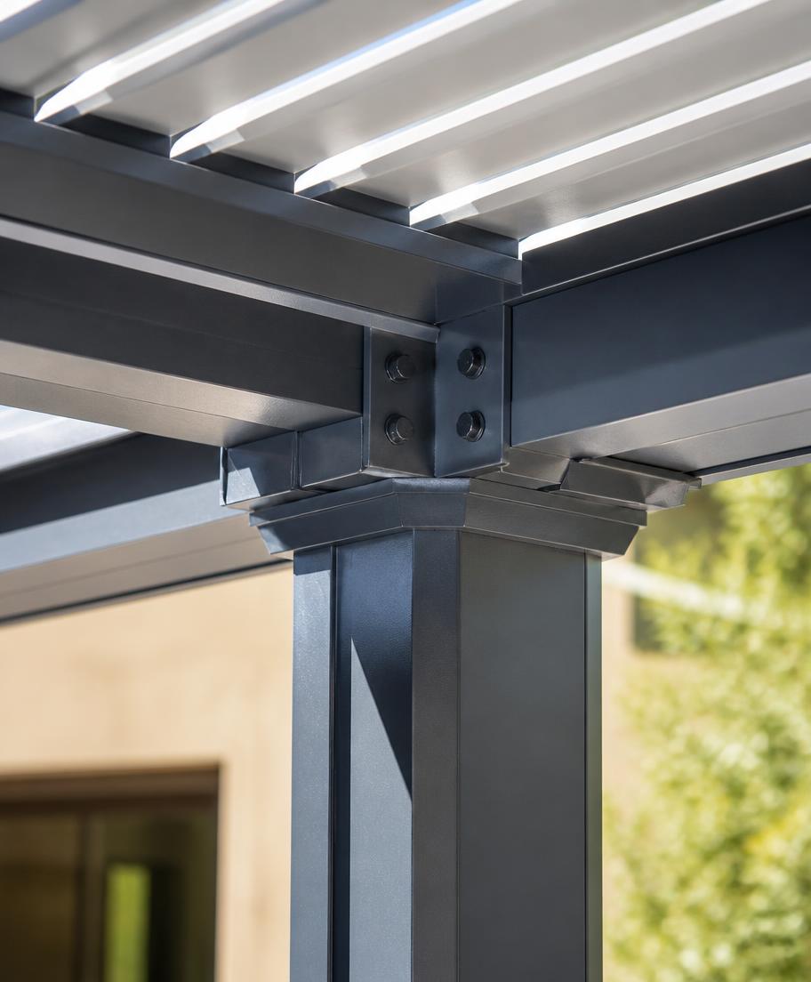Close-up of an aluminum patio cover beam and post connection