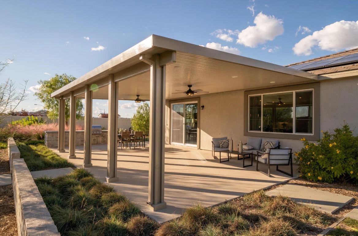 Insulated aluminum patio cover with ceiling fans and recessed lighting, installed by A & J Legacy Awning